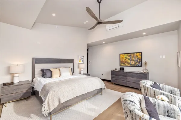 a bedroom with a bed and furniture