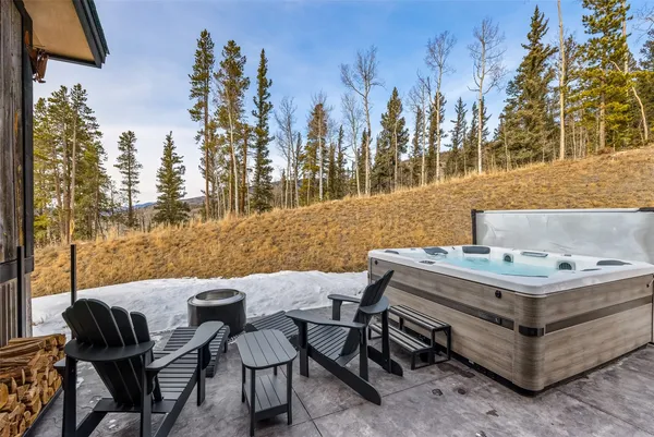 a view of a terrace with furniture and sitting area