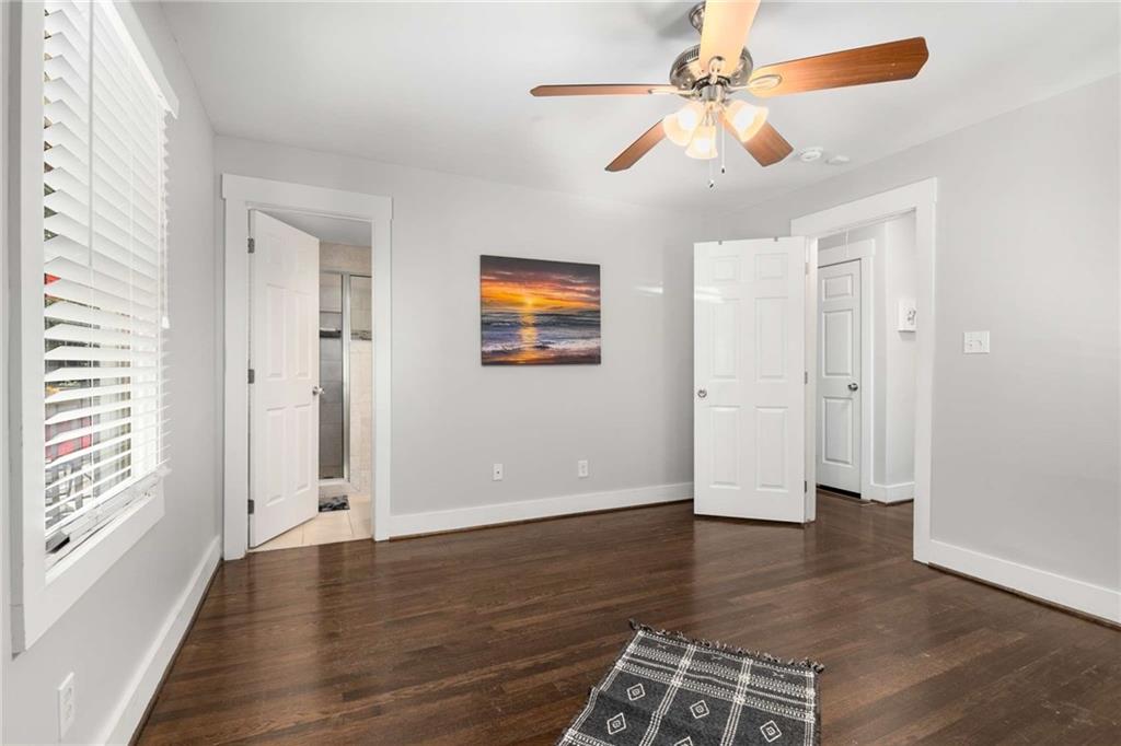 2046 Settle Circle Southeast Atlanta, GA 30316 - Photo 23 of 36 wooden floor in an empty room with a window
