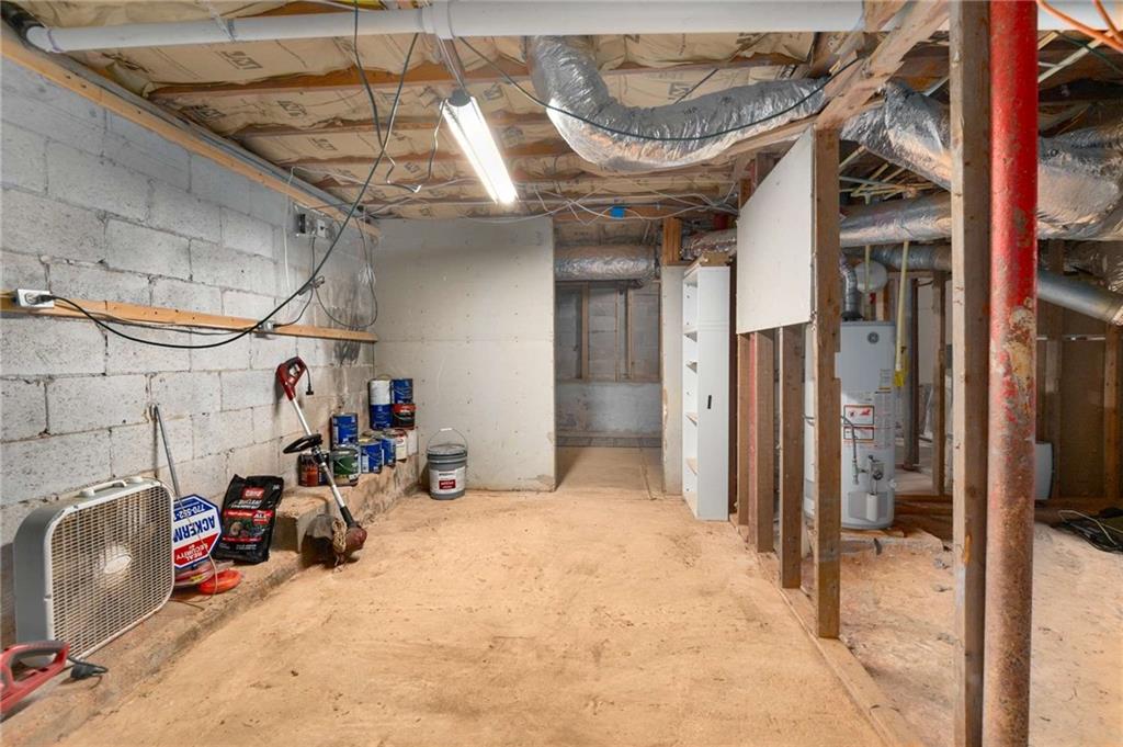 2046 Settle Circle Southeast Atlanta, GA 30316 - Photo 30 of 36 a view of a storage room with a lot of stuff
