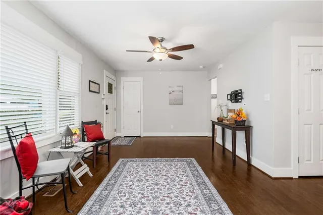 a living room with furniture and a window