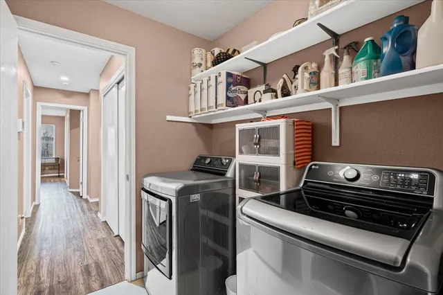 a utility room with dryer and washer
