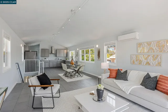 a living room with furniture and a table