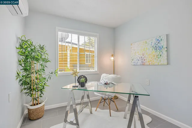 a view of workspace filled with furniture