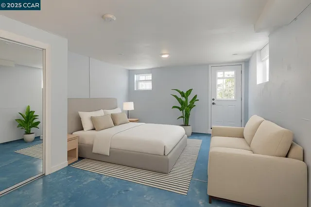 a view of a kitchen with refrigerator and white cabinets