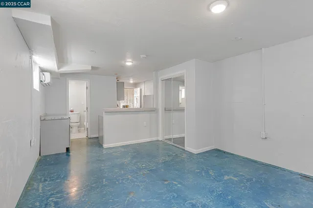 a view of a storage & utility room with a sink