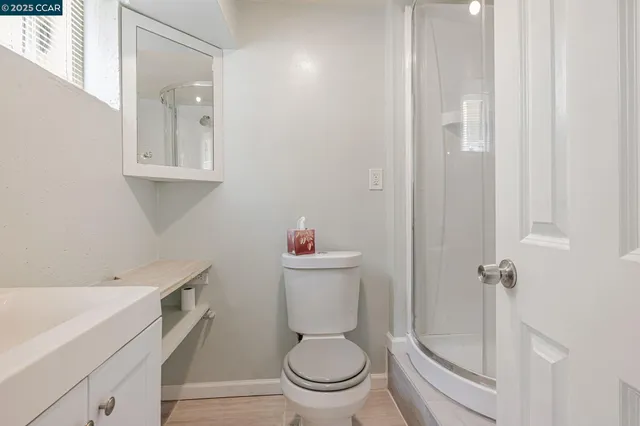 a view of a hallway with stairs