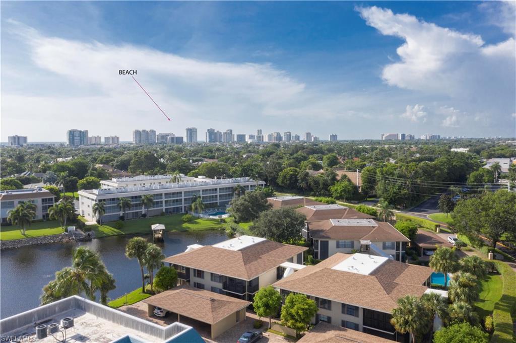 3107 Riviera Drive, Unit A202 Naples, FL 34103 - Photo 24 of 25 a view of a lake