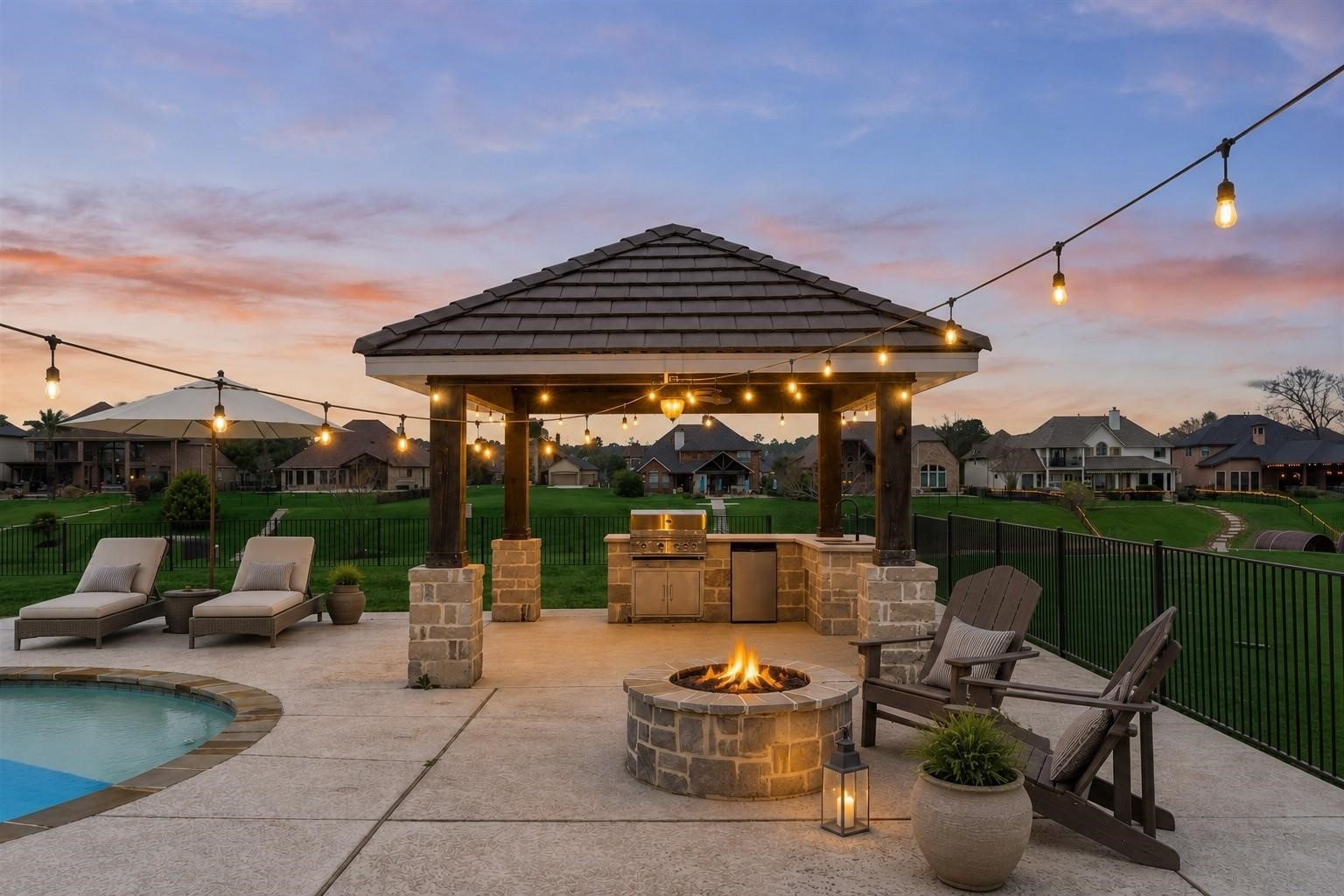 11618 Renaissance Drive Montgomery, TX 77356 - Photo 37 of 47 A covered outdoor kitchen and fire pit complete this perfect space for entertaining! Virtually staged.