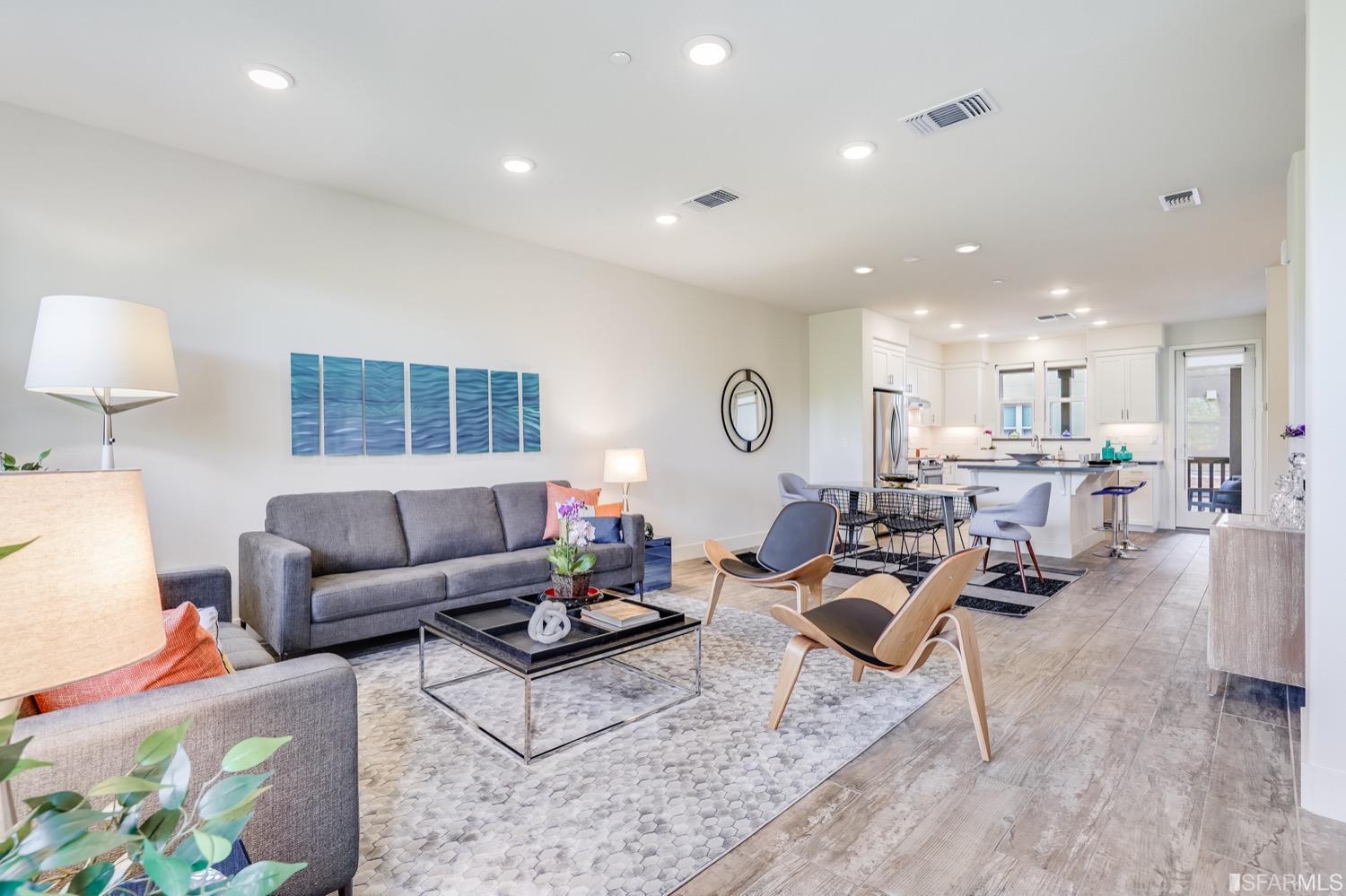 471 Mitchell Avenue Alameda, CA 94501 - Photo 22 of 50 a living room with furniture and a wooden floor