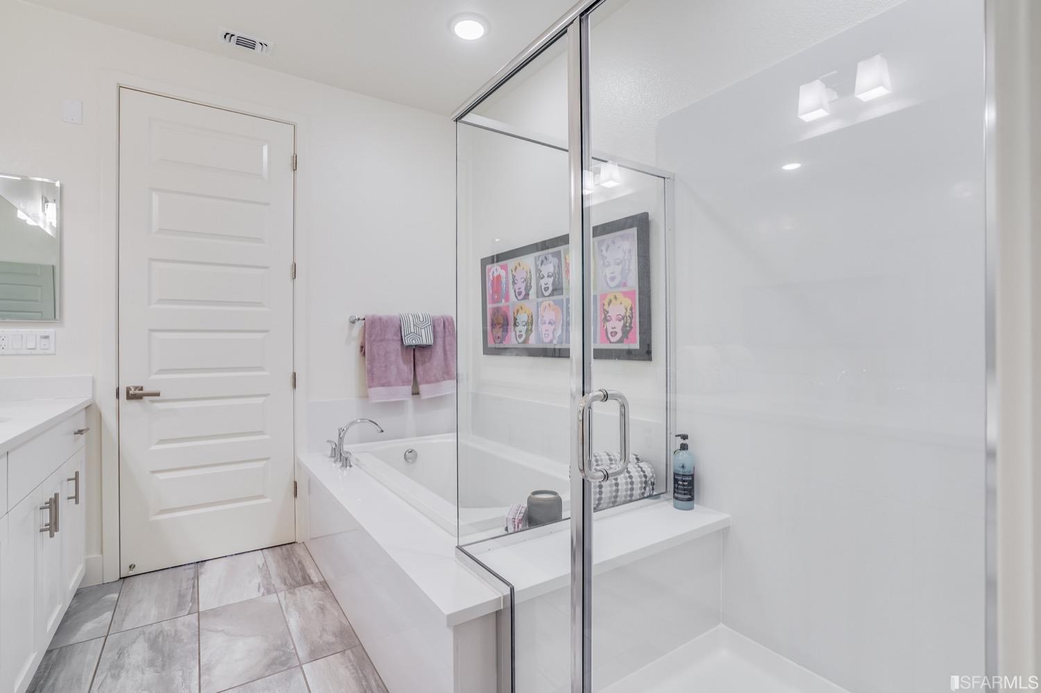 471 Mitchell Avenue Alameda, CA 94501 - Photo 34 of 50 a bathroom with a bathtub and a shower