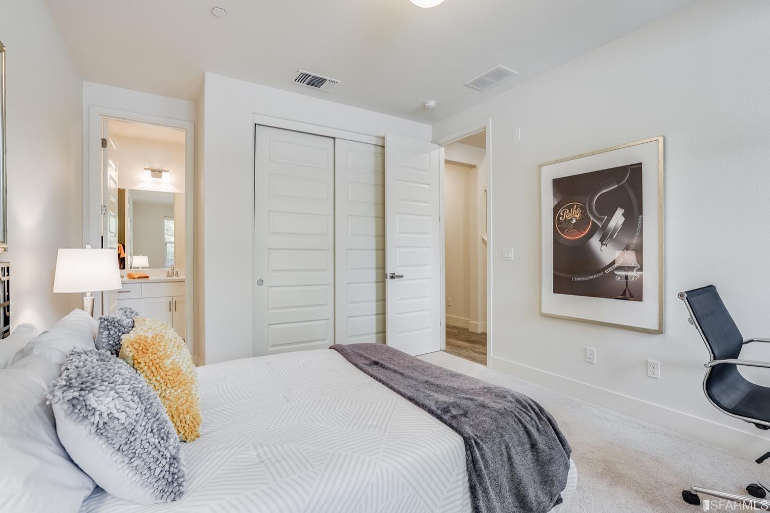 471 Mitchell Avenue Alameda, CA 94501 - Photo 8 of 50 a bedroom with a bed and a painting on the wall