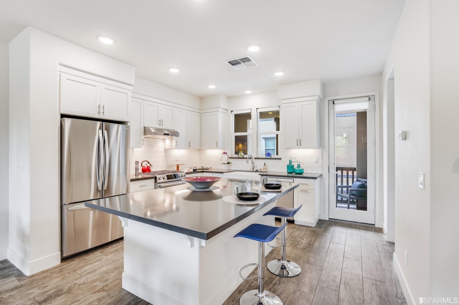 471 Mitchell Avenue Alameda, CA 94501 - Photo 10 of 50 a kitchen with a sink appliances and cabinets