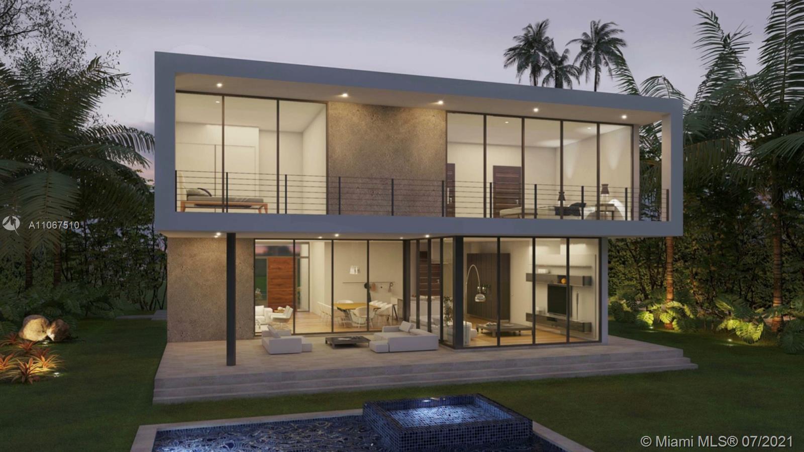 1230 Cleveland Road Miami Beach, FL 33141 - Photo 2 of 3 front view of a house with a yard