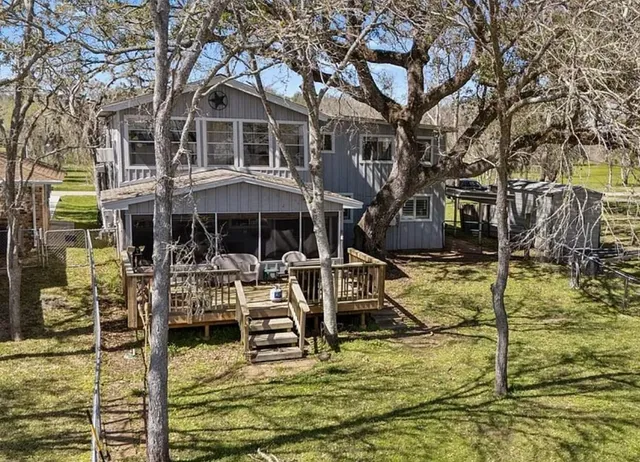 a view of a house with swimming pool