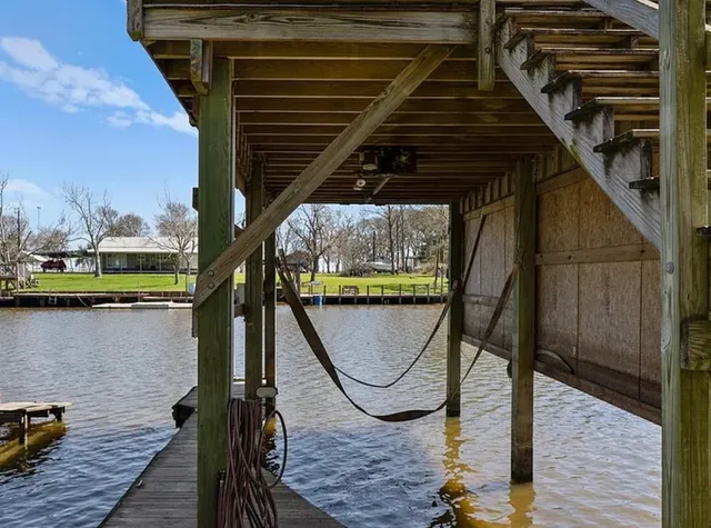 a view of balcony with furniture