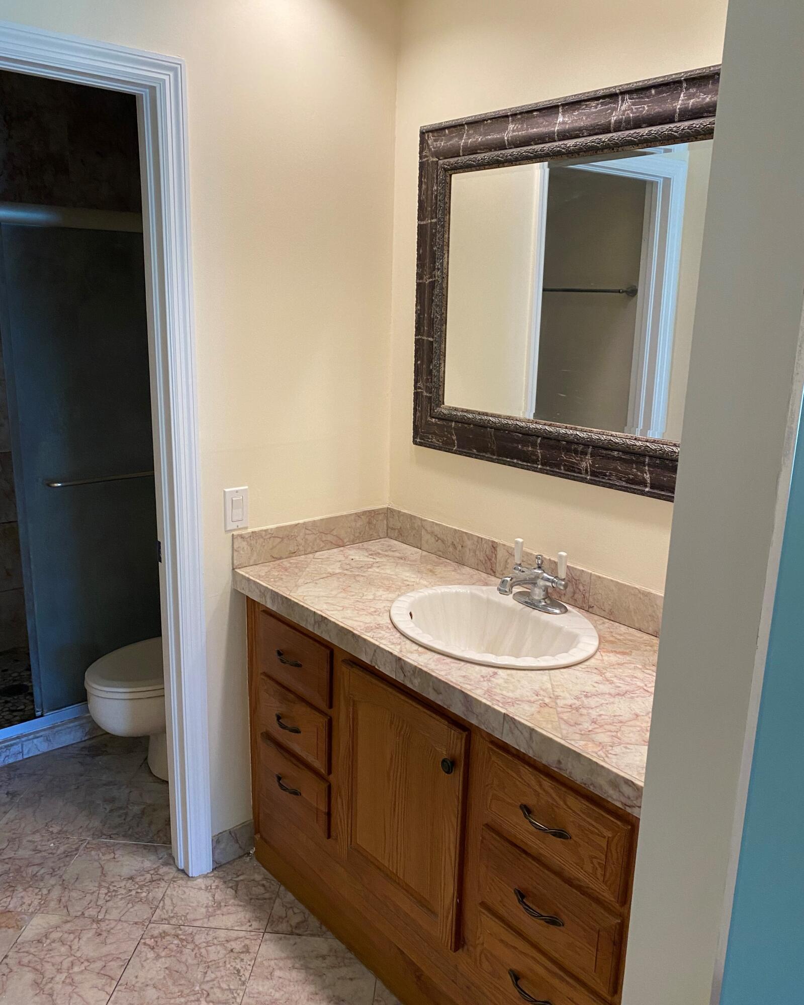 5200 East Club Circle, Unit 206 Boca Raton, FL 33487 - Photo 5 of 9 SR1 master bathroom