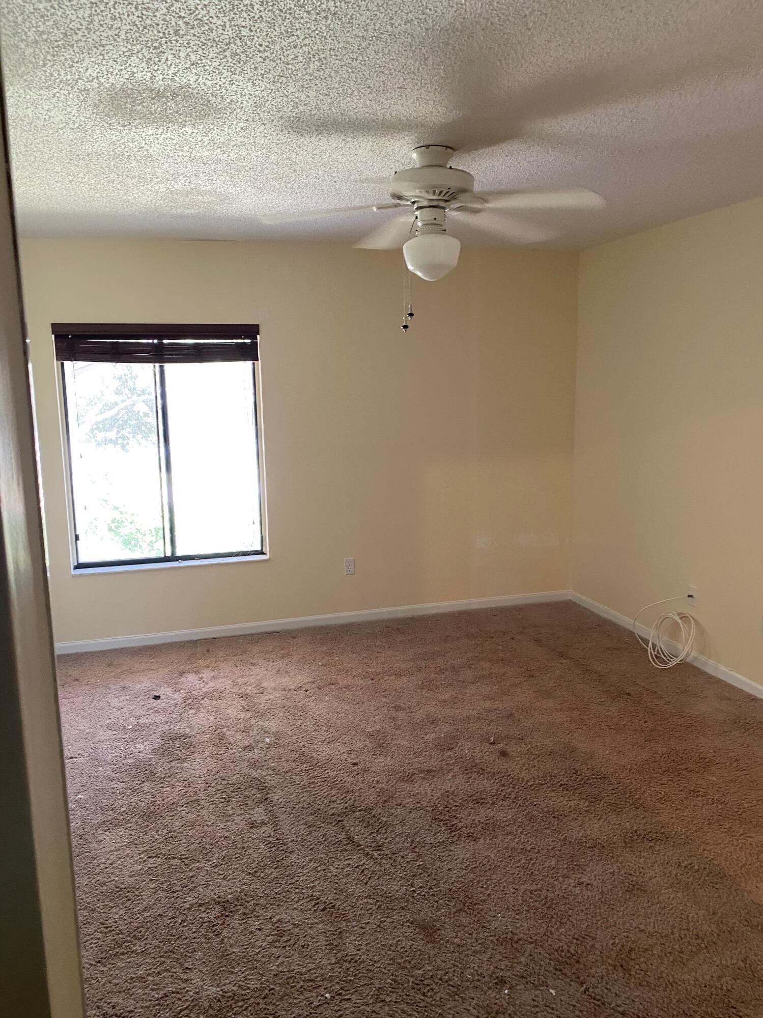 5200 East Club Circle, Unit 206 Boca Raton, FL 33487 - Photo 8 of 9 SR1 master bedroom 11 21