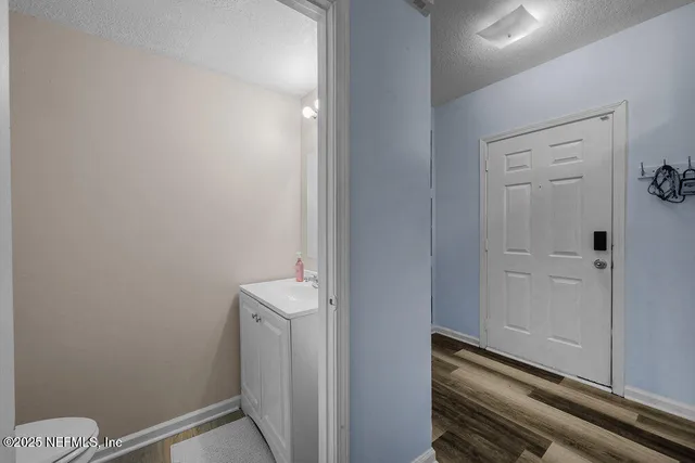 a bathroom with a toilet and a sink