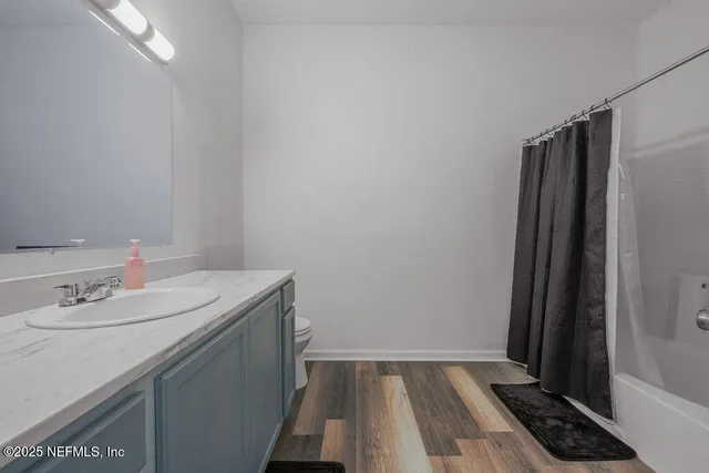 a bathroom with a sink and a toilet