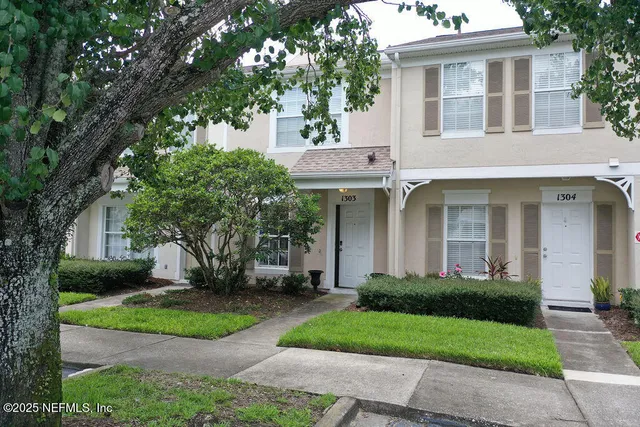 a view of a lake with a city