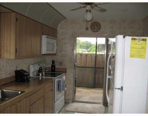 8792 Tyrone Terrace, Unit C Boca Raton, FL 33496 - Photo 3 of 12 Kitchen