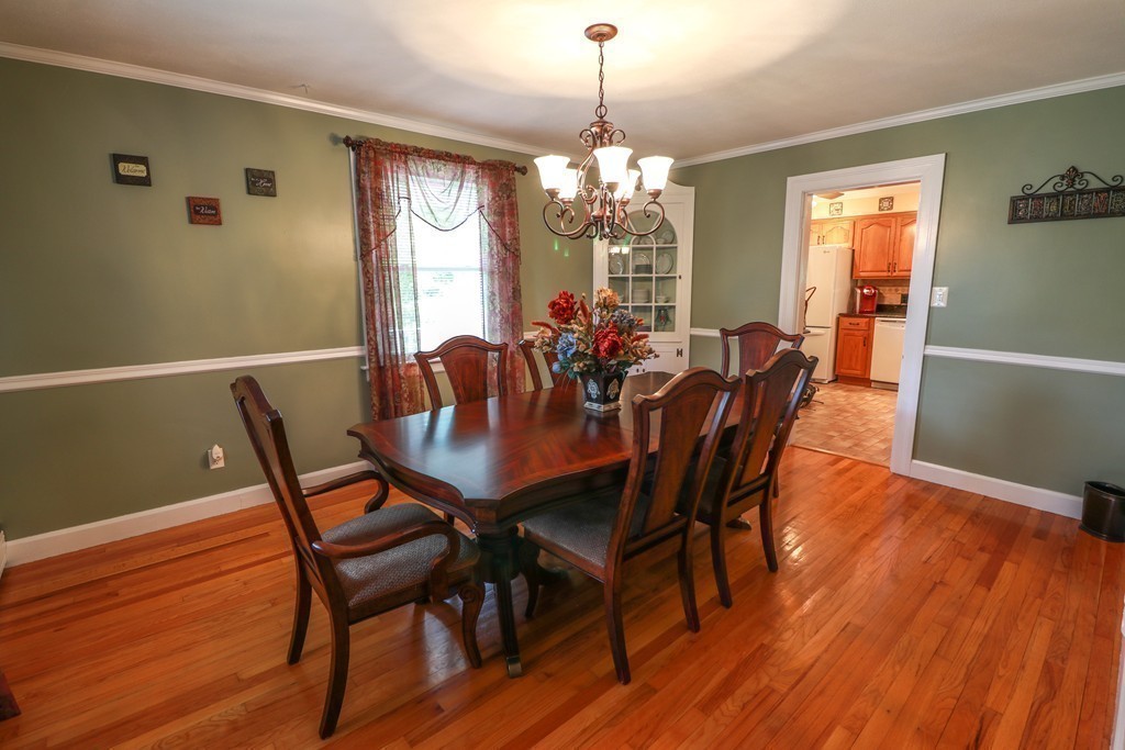 55 Mason Road Dudley, MA 01571 - Photo 6 of 19 a view of a dining room with furniture window and wooden floor