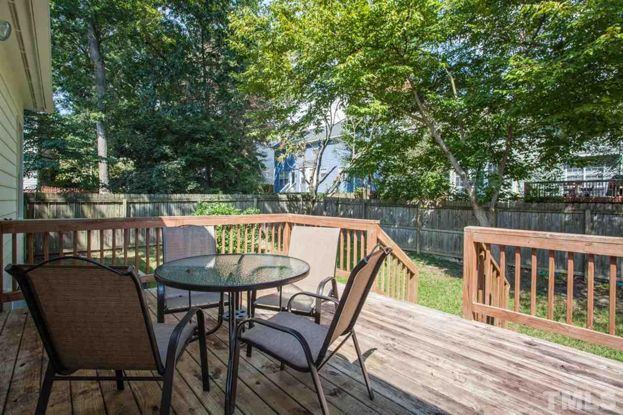 2337 Florida Court Raleigh, NC 27615 - Photo 24 of 25 a view of a chairs and table on the deck