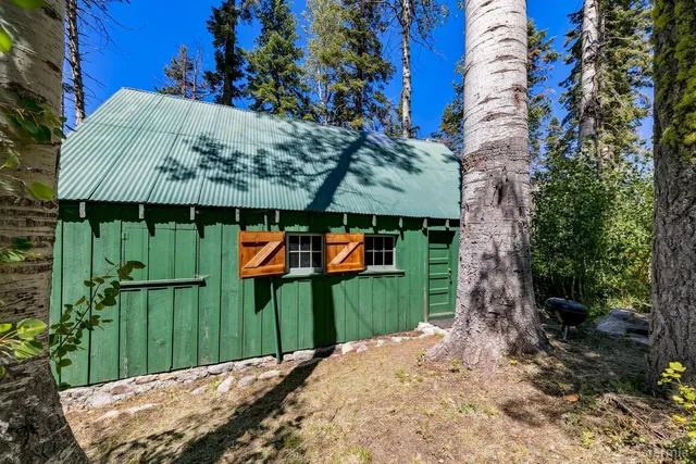 a backyard of a house with lots of green space