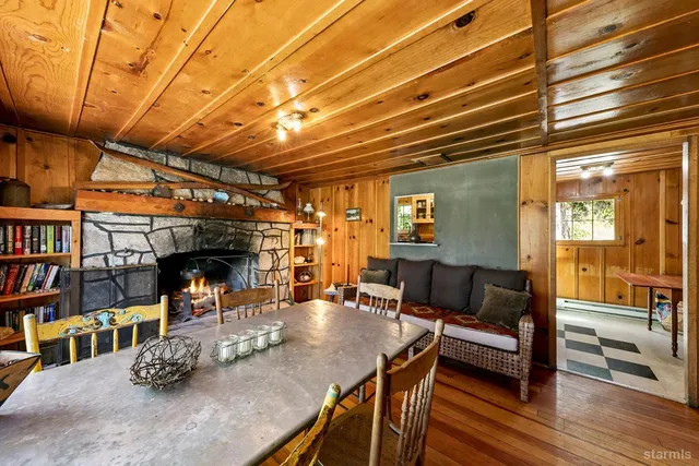 a outdoor living space with furniture and a fireplace