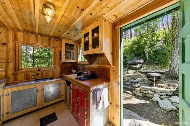 a view of a kitchen with a sink and a stove