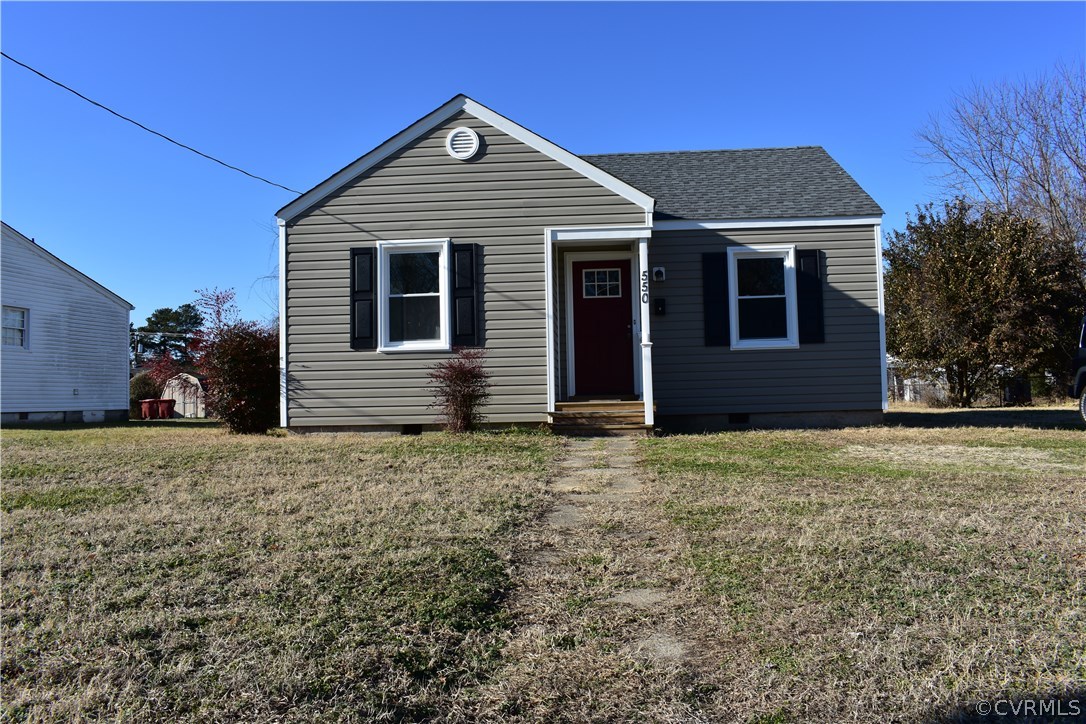 550 Riverview Road Colonial Heights, VA 23834 - Photo 1 of 26 a front view of a house with a yard