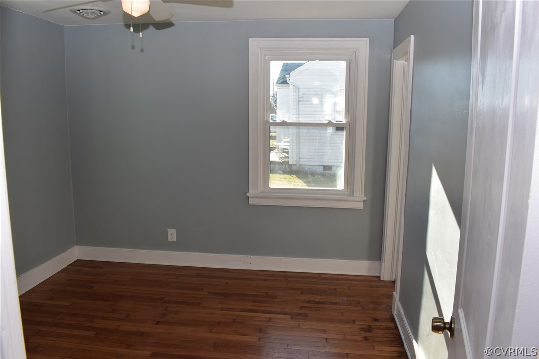 550 Riverview Road Colonial Heights, VA 23834 - Photo 12 of 26 a view of an empty room with wooden floor and a window