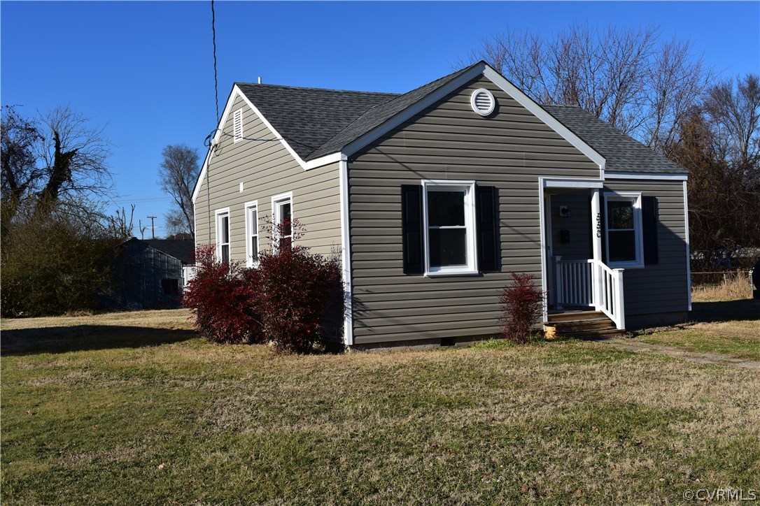 550 Riverview Road Colonial Heights, VA 23834 - Photo 2 of 26 a front view of a house with a yard