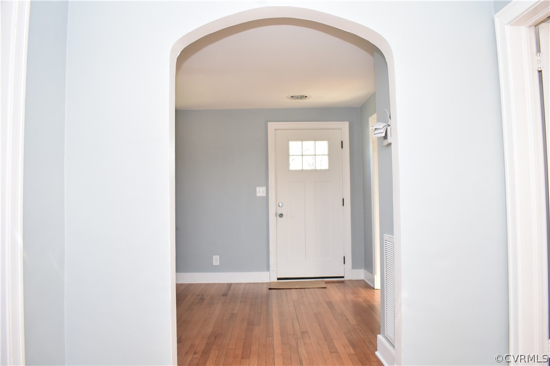 550 Riverview Road Colonial Heights, VA 23834 - Photo 5 of 26 a view of an empty room with wooden floor