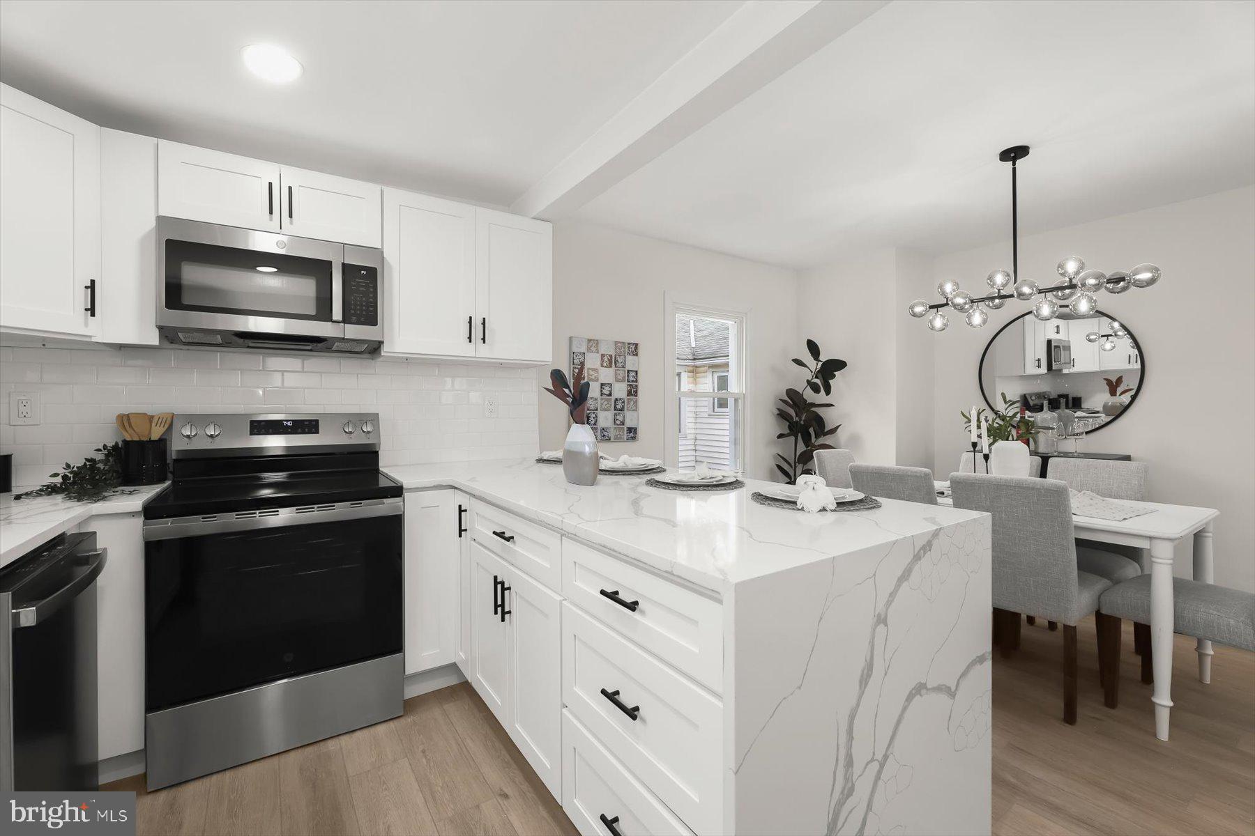 8701 Emge Road Parkville, MD 21234 - Photo 9 of 24 Quartz counters & Island