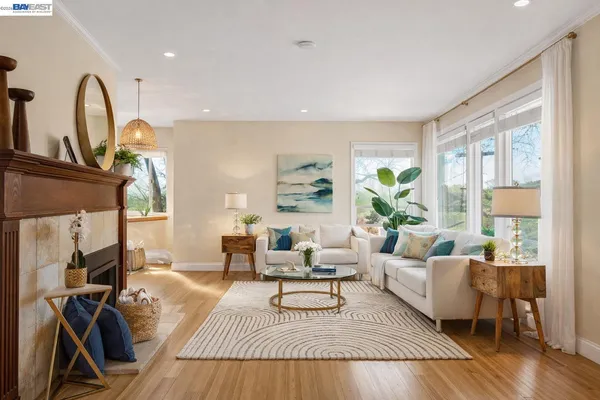 a living room with furniture rug and window
