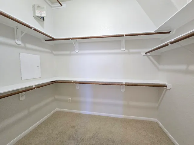 a view of a room with racks on the wall