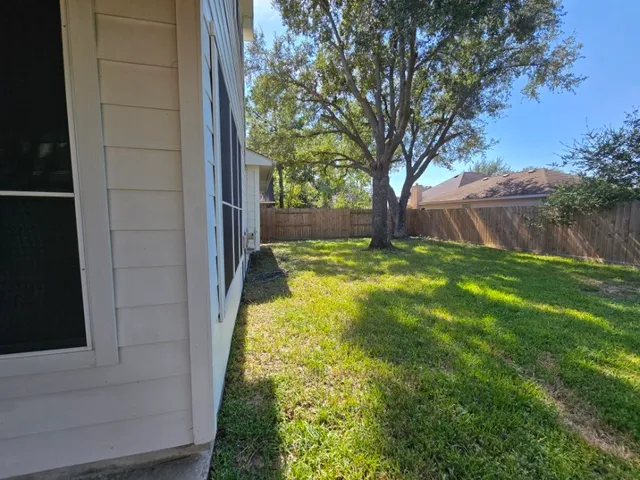 a view of a yard with an trees