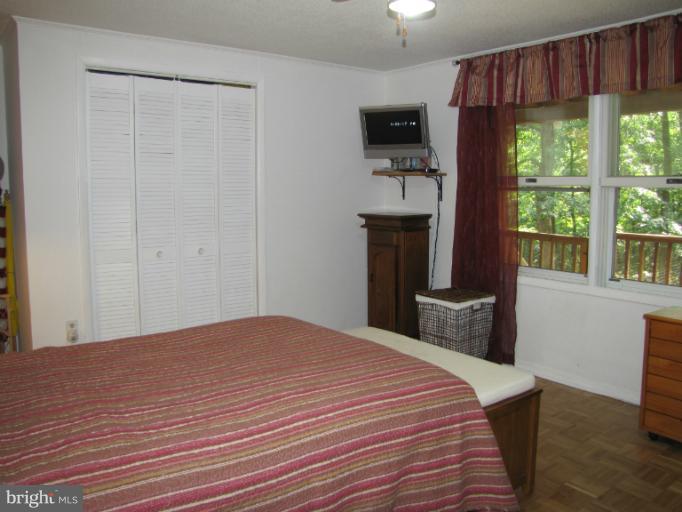 7203 Edgemont Road Frederick, MD 21702 - Photo 28 of 28 Bedroom has large closet space