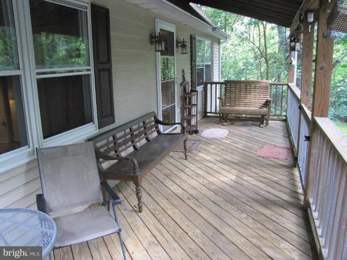 Full length porch for your relaxation.