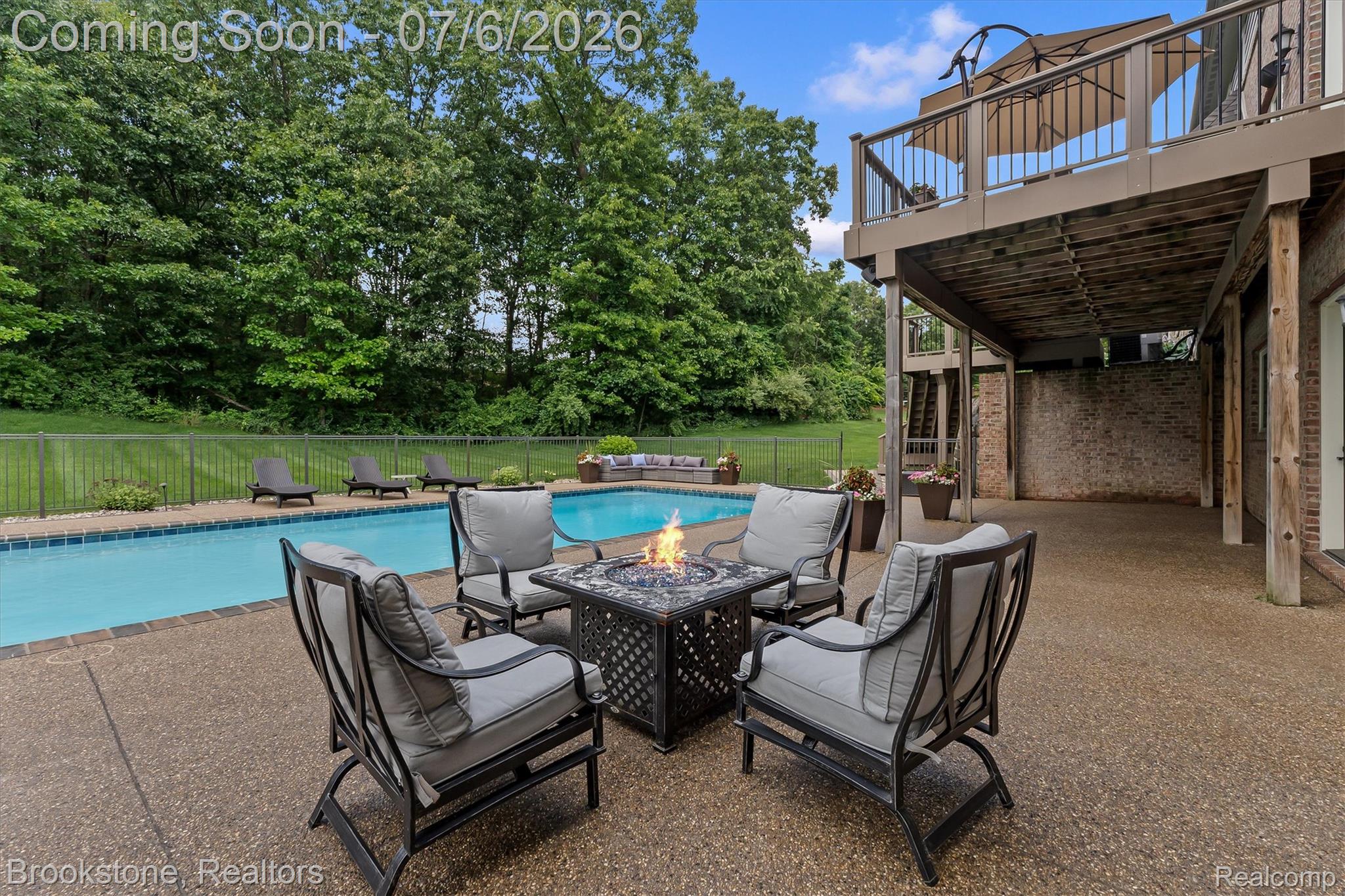 5458 Boulderwood Ridge Clarkston, MI 48348 - Photo 51 of 52 Freshly glazed exposed aggregate patio, garden pathways and driveway