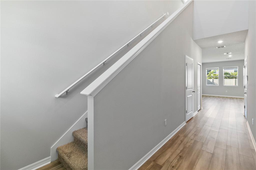 5617 Bungalow Grove Court Palmetto, FL 34221 - Photo 16 of 31 a view of entryway with wooden floor