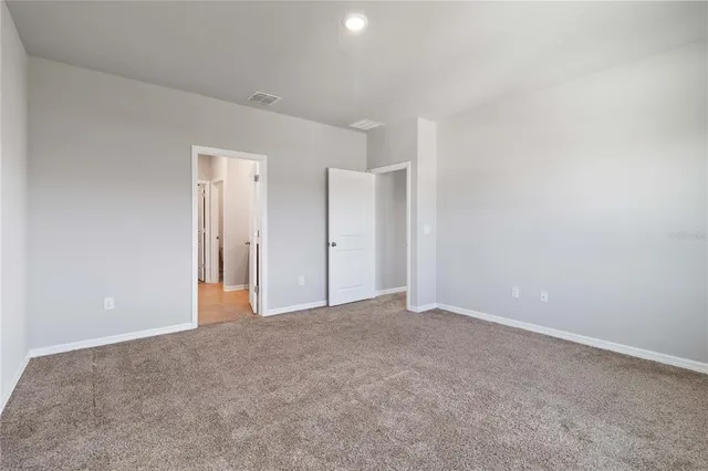 a view of a room with racks on the wall