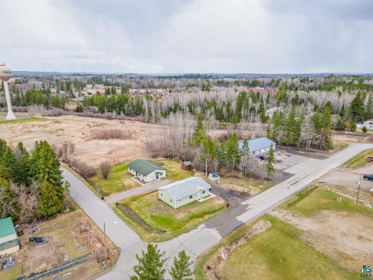 228 3rd Street Southeast Cook, MN 55723 - Photo 25 of 30 Aerial perspective showcasing a residential and commercial property
