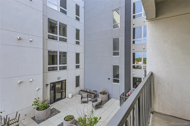 a view of dinning table and chairs in patio