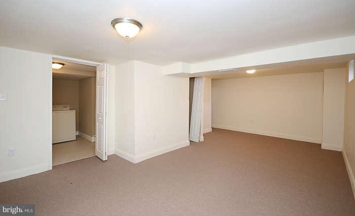 4305 Wakefield Road Baltimore, MD 21216 - Photo 20 of 25 an empty room with closet area and bathroom
