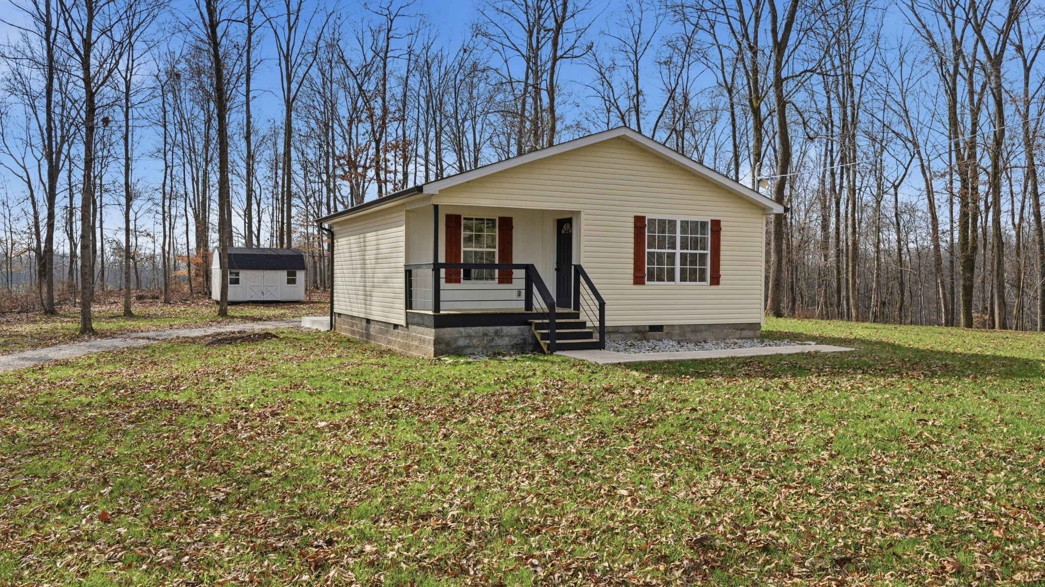 790 Preston Ridge Road Mulberry, TN 37359 - Photo 1 of 44 a house with trees in the background