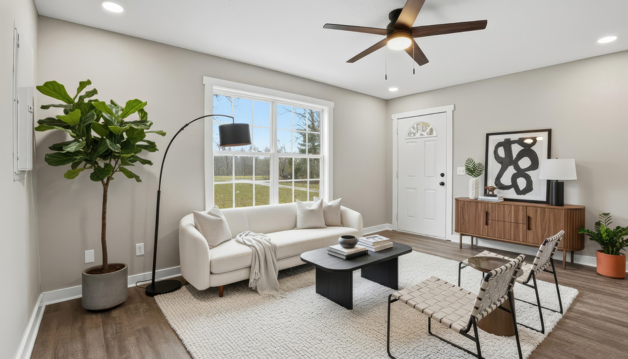 790 Preston Ridge Road Mulberry, TN 37359 - Photo 11 of 44 a living room with furniture and a potted plant
