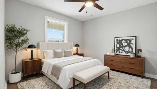 a bathroom with a sink toilet a mirror and shower